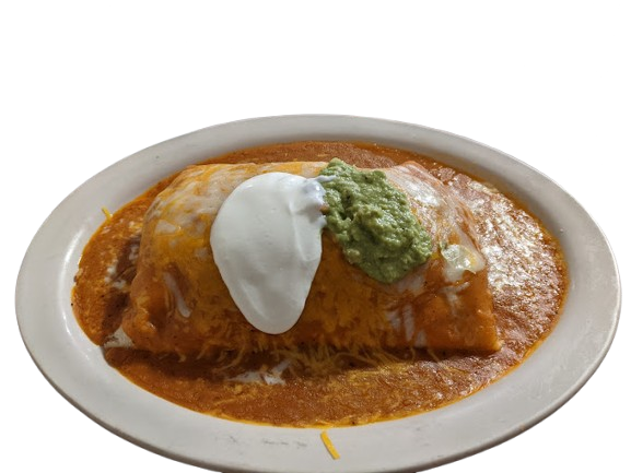 a burrito covered with red sauce and cheese, topped with sour cream and guacamole